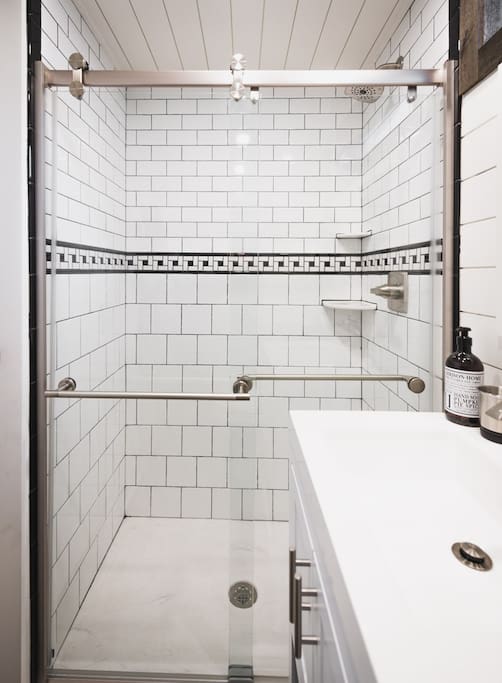 Full size, custom-tiled shower.