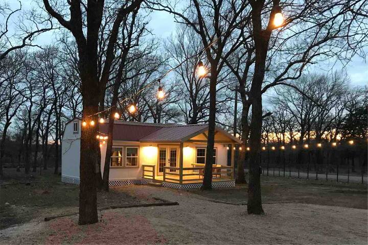 Enjoy a Texas sunset on the farm while  sitting on the large front porch.