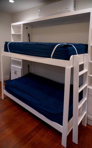 Twin Murphy bunkbed in living area upstairs 