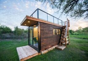 Our 20' container home clad in Shou Sugi Ban siding.