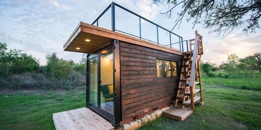 Our 20' container home clad in Shou Sugi Ban siding.